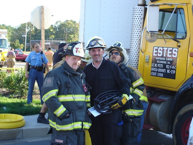 Two HazMat Techs and Chief 18(go getem Tom)